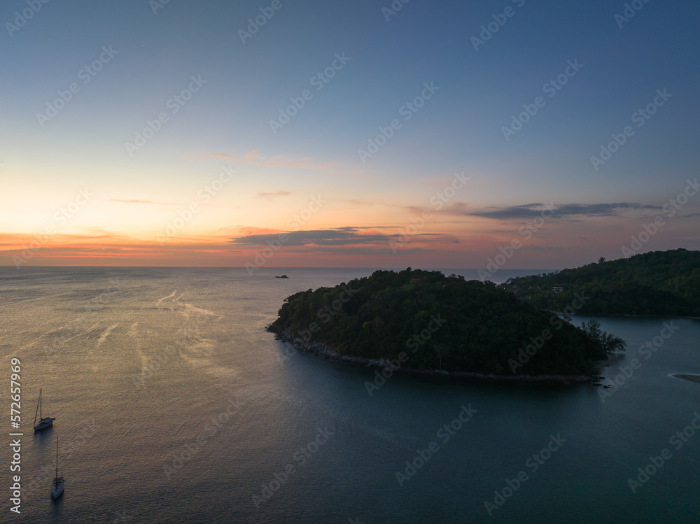 .aerial view beautiful sunset above Kala island at Layan beach Phuket..colorful sky of sunset at horizon.Phuket beach sea Amazing beach, .Beautiful beach Phuket Thailand, Nature and travel concept. .aerial view beautiful sunset above Kala island at Layan beach Phuket..colorful sky of sunset at horizon.Phuket beach sea Amazing beach, .Beautiful beach Phuket Thailand, Nature and travel concept.