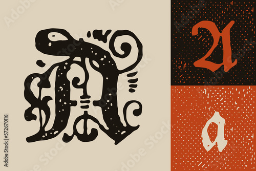 A letter drop cap logo. Illuminated initial and blackletter uppercase and lowercase.