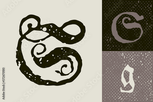 G letter drop cap logo. Illuminated initial and blackletter uppercase and lowercase.