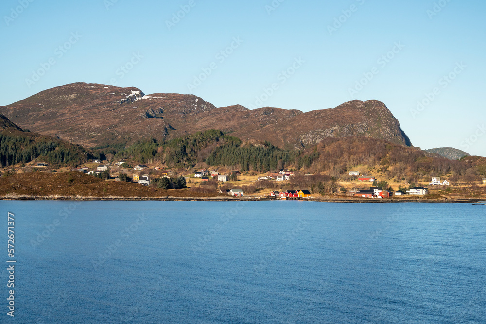Community on the Norwegian coast seen from the sea