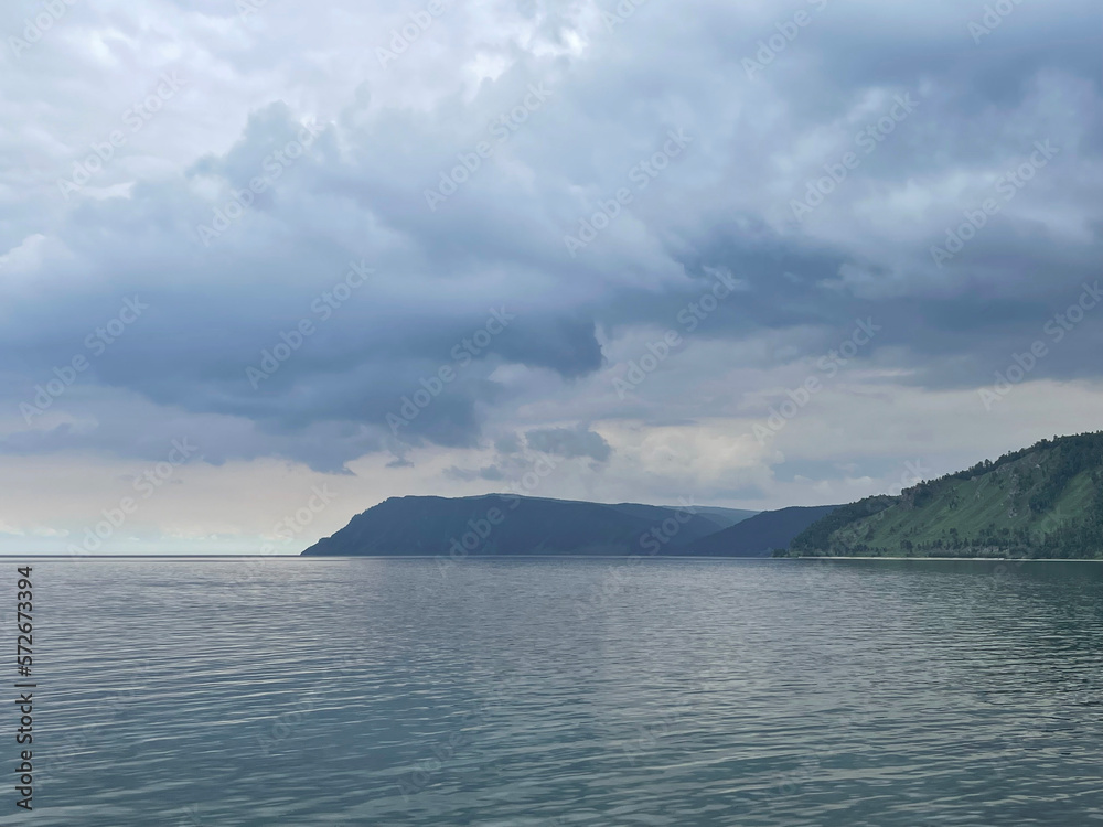 Heavy gray clouds over Baikal Lake