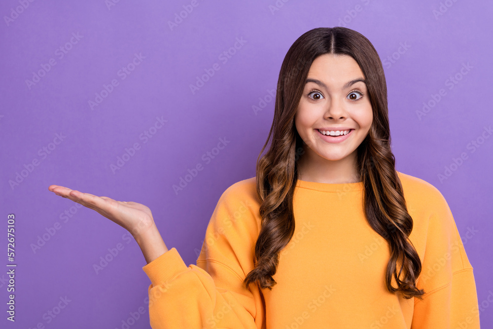 Photo of charming cute lady wear trendy clothes arm presenting empty space black friday discounts isolated on purple color background