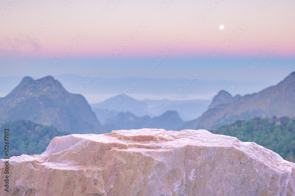 Stone podium table top with outdoor mountains pastel color scene nature landscape at sunrise blur background.Natural beauty cosmetic or healthy product placement presentation pedestal display. - obrazy, fototapety, plakaty 