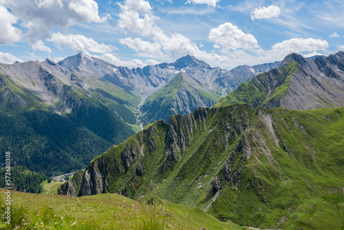 A view of the highest mountains of Switzerland. And in the background you can see al little bit of the town Samnaun. The photo was taken from the Alp Trida Sattel in Austria. 