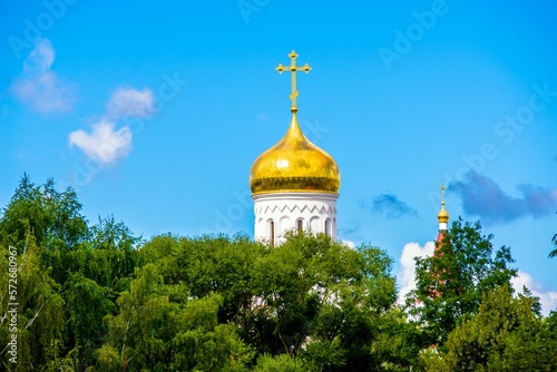Domes of the Orthodox Church with crosses against the blue sky 
