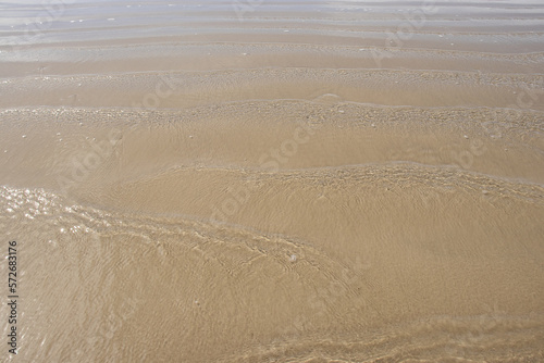 natural texture of sea waves and sand