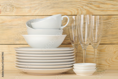 Tableware on a wooden background. Clean tableware.