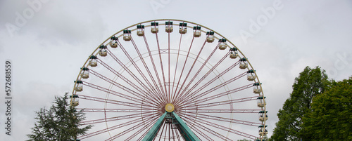 a ferris wheel with a claer sky background photo