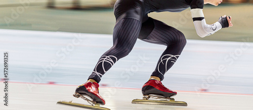 close-up legs man speed skater athlete photo