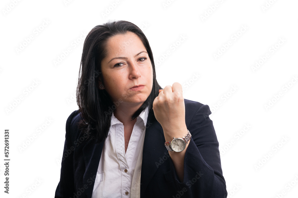Mad female entrepreneur showing fist as angry gesture Mad female entrepreneur showing fist as angry gesture