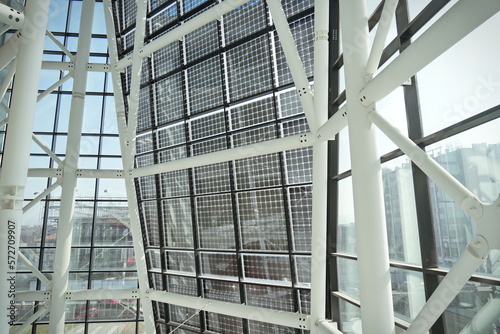 facade of solar panels seen from inside the modern building