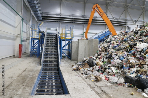 conveyors in the workshop of a waste sorting plant
