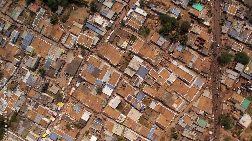 An aerial top view of an Indian village with old buildings and small ...