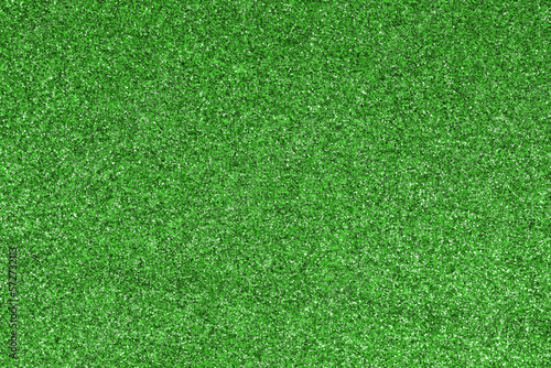 GREEN shimmering glitter material background with glowing effects