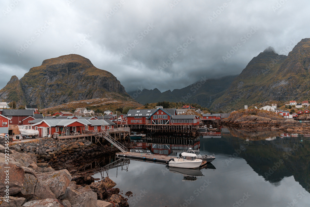 Cute town in Norway with boat and houses