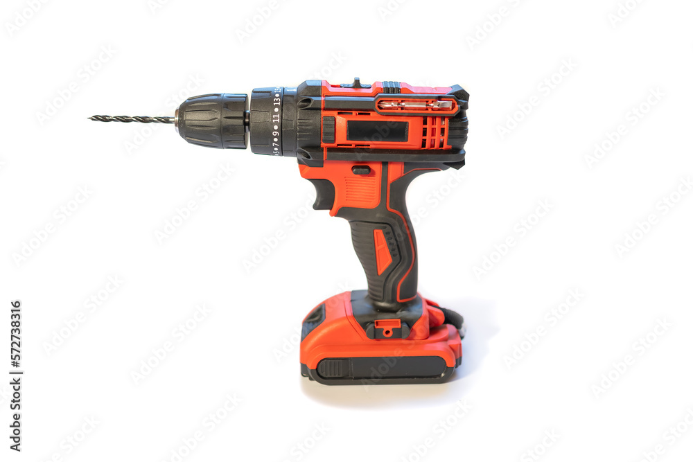 Electric drill and screwdriver of batteries without cables, isolated on white background.