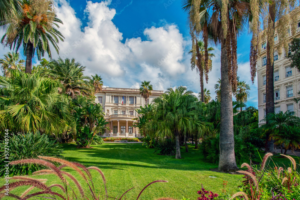 Panorama of  Muséna Massena Gardens in summer.  In distance old building of museum  in Nice, French Riviera