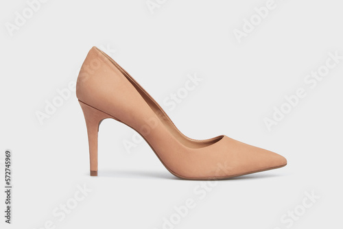 Beige pointy toe women's shoe with high heels isolated on white background. Female classic stiletto heels in suede leather. Single. Mock up, template