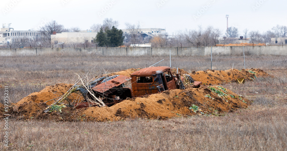 Fototapeta premium Destroyed Russian military equipment by the Ukrainian army during the occupation of Kherson. War of Russia against Ukraine. Liberation of Kherson from the Russian invasion