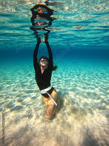 gloria dancing at the famous blue lagoon at akamas peninsula at cyprus island