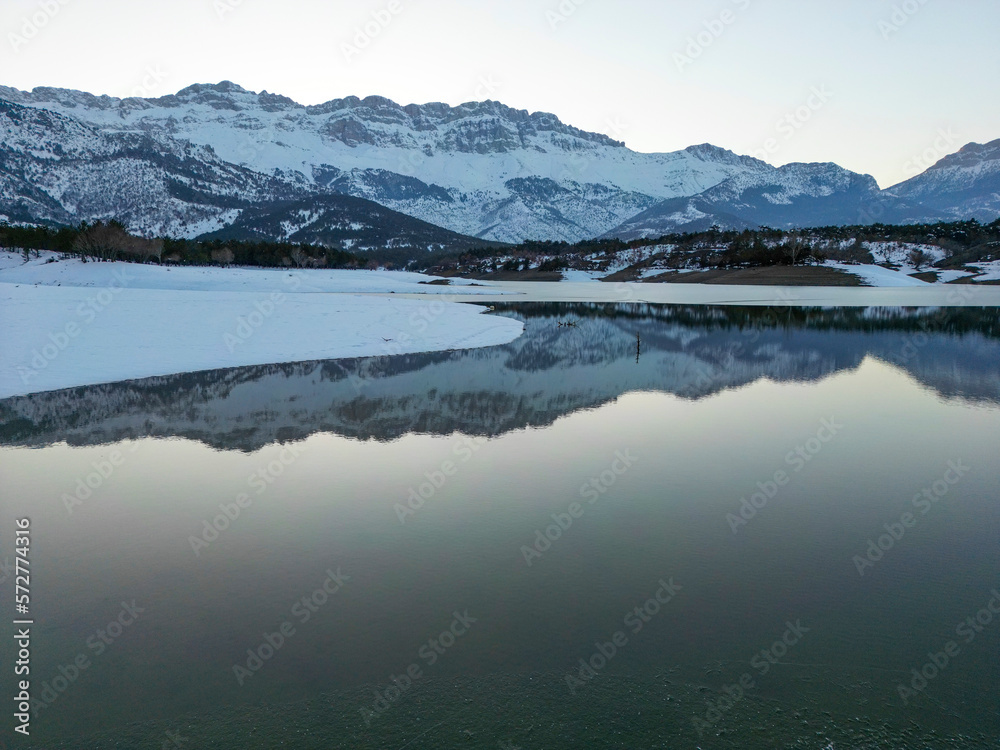 sunset time on frozen lake, wonderful nature and amazing mountains