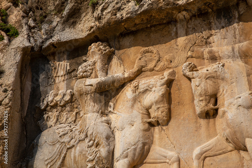 Rock Relief of Bahram I and Ahura Mazda, Chogan Valley, Fars, Iran photo