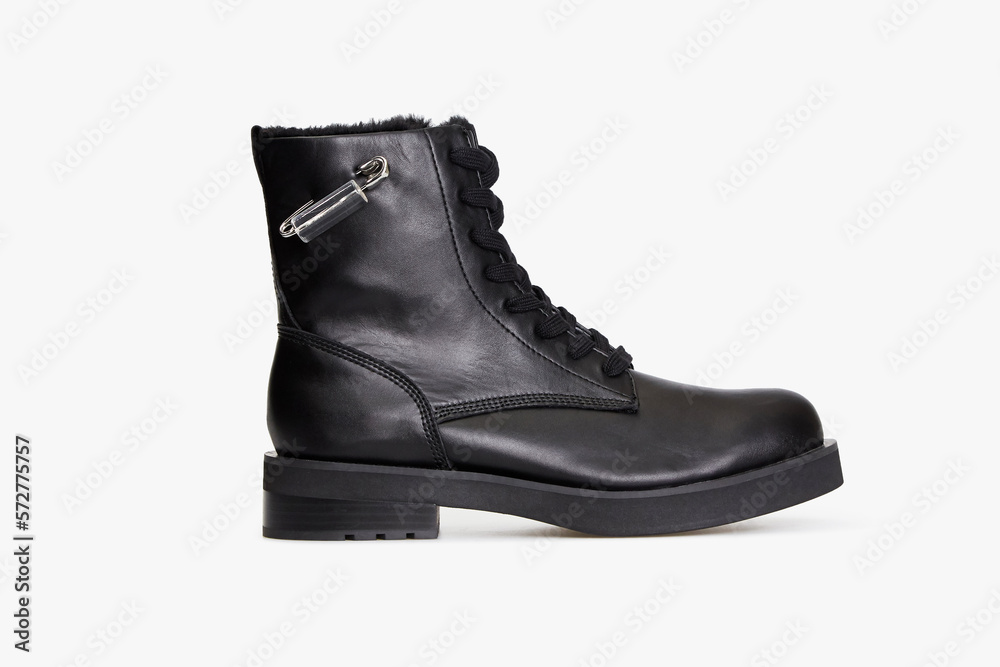 Black men's classic leather ankle boots isolated on white background. Business formal male polished glossy shoes. Winter boot for man with fur inside. Single. Template, mock up