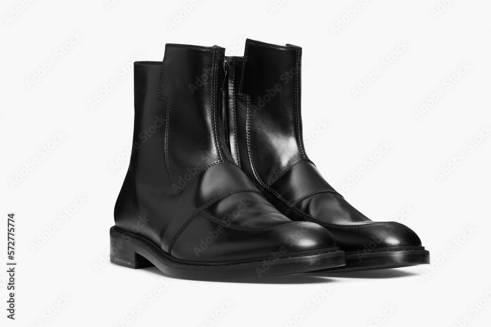 Black men's classic leather ankle boots isolated on white background. Pair of business male polished glossy shoes. Template, mock up