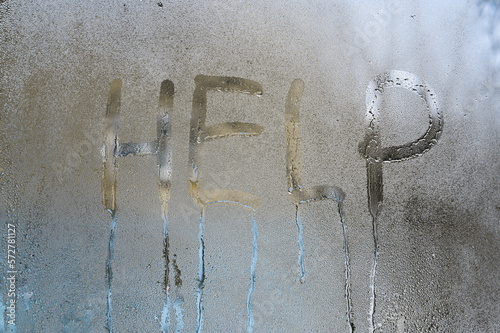 help - written on the glass