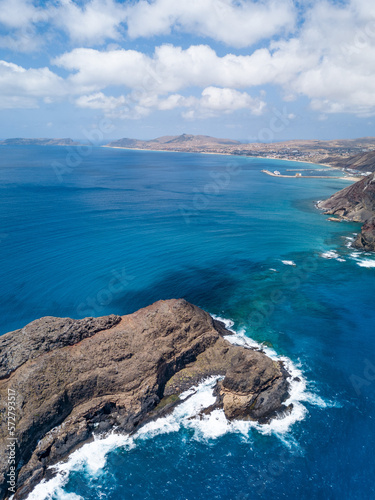 "Ilhéu de cima" (islet) at Porto Santo Island. Aerial view of the southern coast of the island. Copy space.