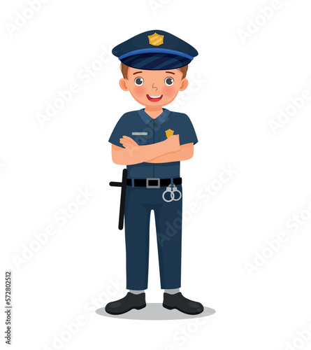 Cute little boy wearing police uniform pretending to be police officer