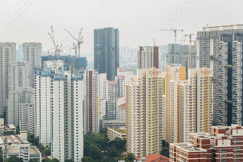 Cityscape of skyscrapers and construction in Singapore from above