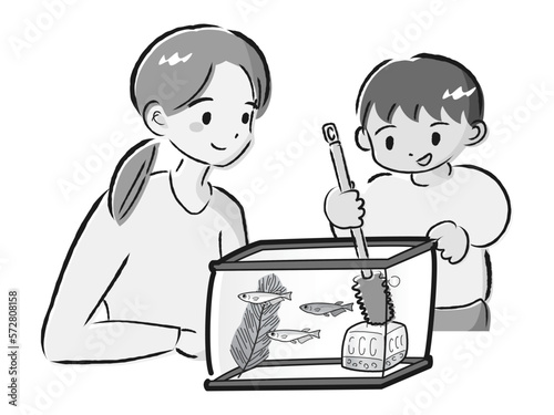 メダカのお世話をする親子（水槽の掃除）