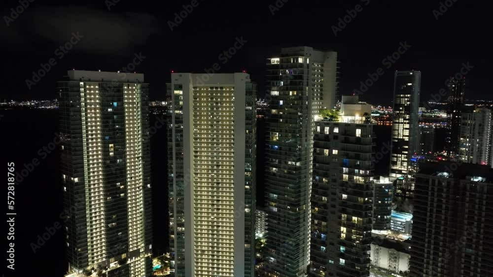 Aerial night scene Miami 4k circa 2023 highrise construction towers Aerial night scene Miami 4k circa 2023 highrise construction towers