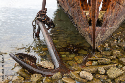 Close up of old Rusted Ship Anchor.  Lord Lonsdale Shipwreck Hull on Strait of Magellan, Punta Arenas Chilean Patagonia Coast photo