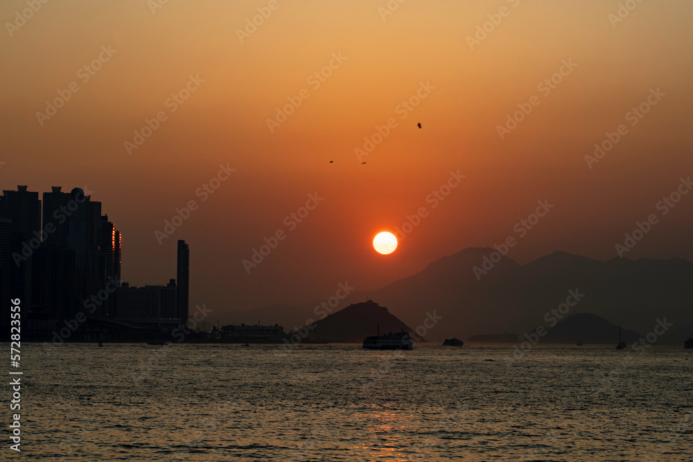 Sunset, a view from the Kowloon side.  Fantastic weather, but the view was hazy as the air getting polluted.  