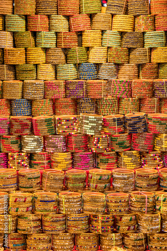 Colorful bangles up for sale in India street market  selective focus.