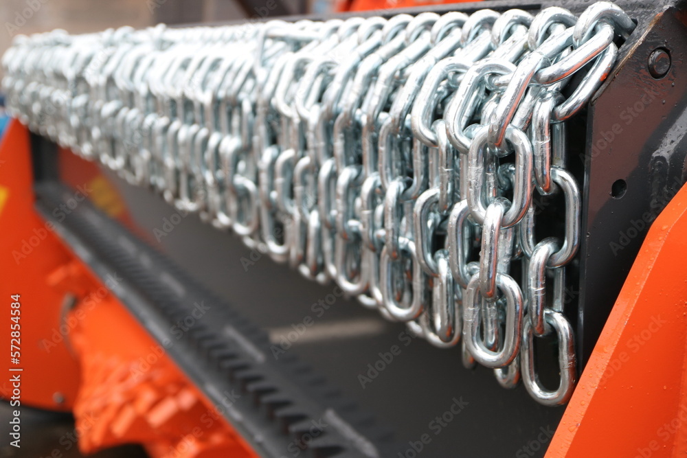 Fototapeta premium number of mounted cultivator chains.