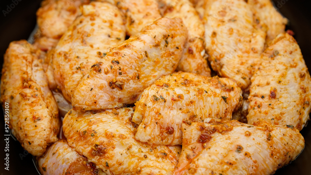 Chicken wings marinated in seasoning Chicken wings marinated in seasoning