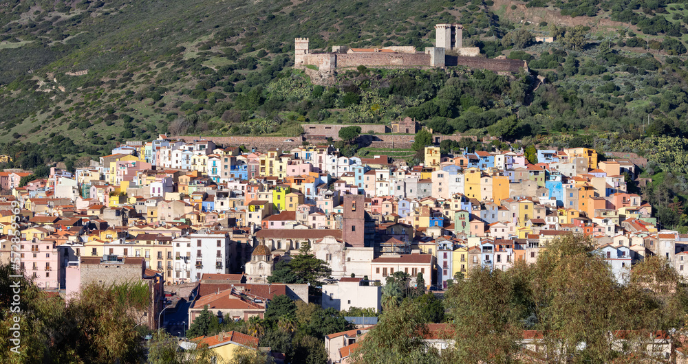 Fototapeta premium Homes and Apartments in Touristic Town. Bosa, Sardinia, Italy. Sunny Fall Season Day.
