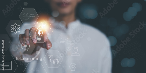 Male hand pointing at icon, lessons and Internet online education and learning concept, professional courses, learning new things, e-learning webinars, skill enhancement to develop a new career