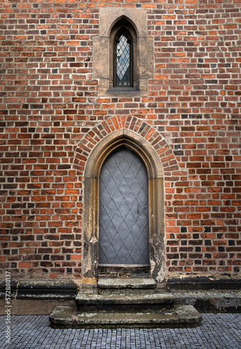 Gothic door to the temple.
Curved arch - the most characteristic features of Gothic. photo