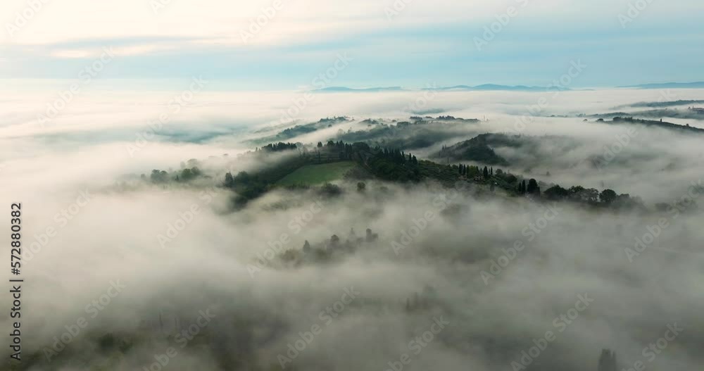 Clouds And Fog Over The Mountain Hills, Trees And Forest In Sunrise In Turcany, Italy. - aerial Clouds And Fog Over The Mountain Hills, Trees And Forest In Sunrise In Turcany, Italy. - aerial