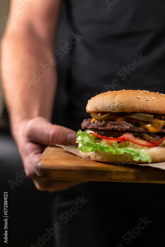 burger in hands
