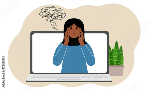 Online consultation with a psychologist. Laptop with a muslim woman with confused thoughts. Psychotherapeutic practice, psychiatric consultation.