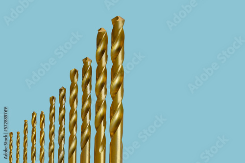 drill bits on a blue background.