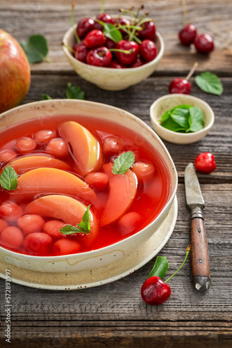 Sweet and healthy fruit soup made of summer fruits.