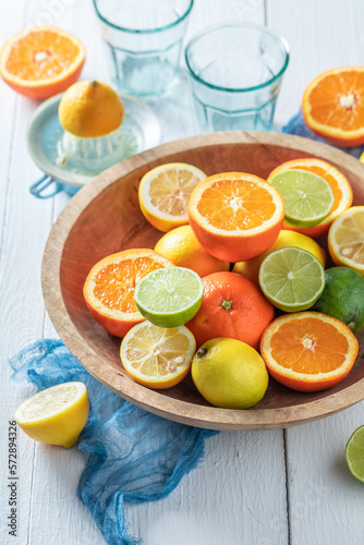 Mix of citrus fruits with oranges, lemons and limes.