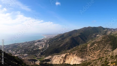 Landscape of Mediterranean sea and surrounding towns from the top of mount Calamorro, near Malaga in the Costa del Sol in Spain photo