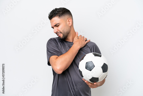 Arab young football player man isolated on white background suffering from pain in shoulder for having made an effort